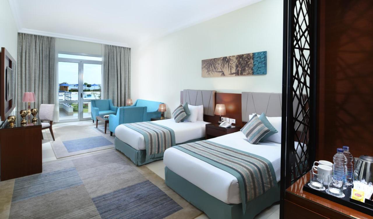 Tolip El Forsan Hotel Ismailia Exteriör bild A room at the hotel