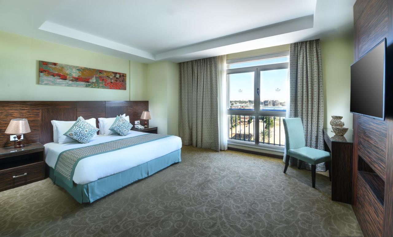 Tolip El Forsan Hotel Ismailia Exteriör bild Deluxe Room