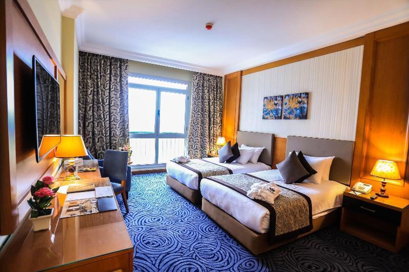 Tolip El Forsan Hotel Ismailia Exteriör bild A room at the hotel