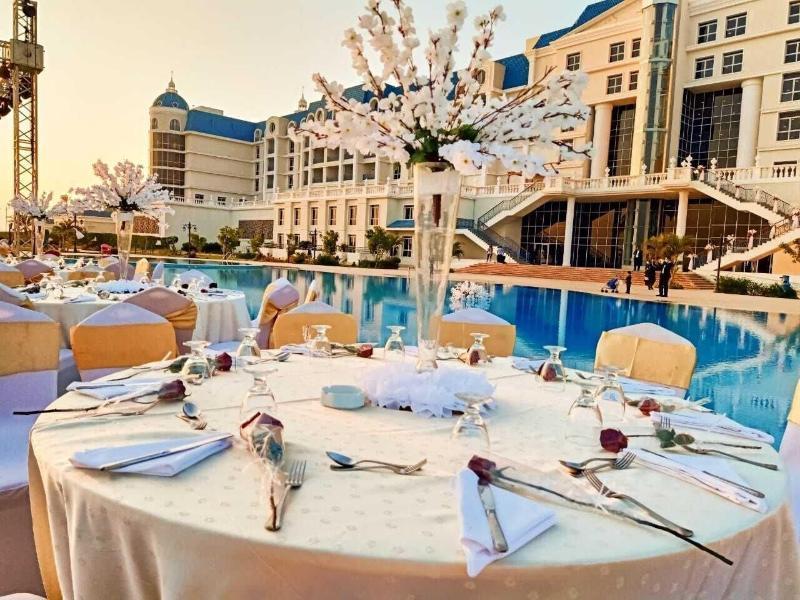 Tolip El Forsan Hotel Ismailia Exteriör bild Wedding reception at the poolside