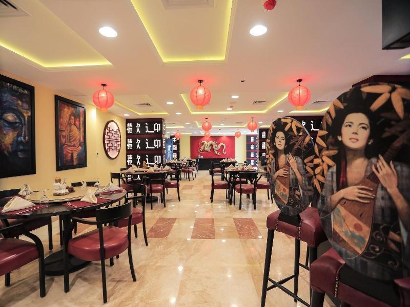 Tolip El Forsan Hotel Ismailia Exteriör bild Interior of a restaurant in Cairo